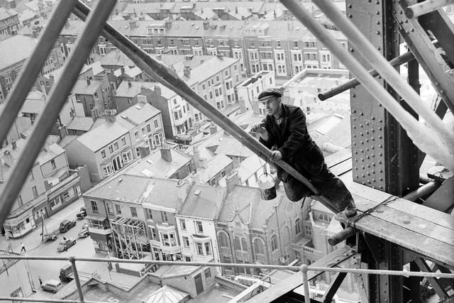 Such brave workers - the photographer as well.