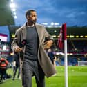 BURNLEY, ENGLAND - SEPTEMBER 23: TNT pundit and former Manchester United player Rio Ferdinand is pitch-side ahead of the Premier League match between Burnley FC and Manchester United at Turf Moor on September 23, 2023 in Burnley, England. (Photo by Ash Donelon/Manchester United via Getty Images)