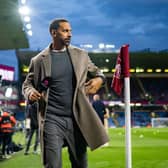 BURNLEY, ENGLAND - SEPTEMBER 23: TNT pundit and former Manchester United player Rio Ferdinand is pitch-side ahead of the Premier League match between Burnley FC and Manchester United at Turf Moor on September 23, 2023 in Burnley, England. (Photo by Ash Donelon/Manchester United via Getty Images)
