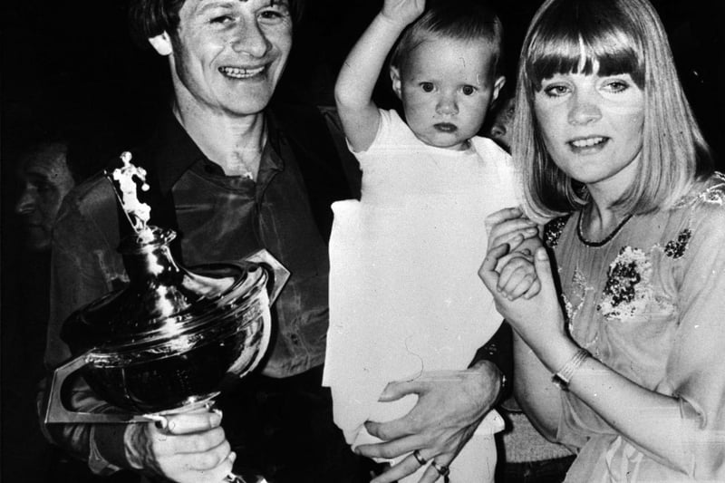 The 1982 World Snooker Champion Alex Higgins celebrates with daughter Lauren and wife Lynne, after a nail-biting battle against six-times champion Ray Reardon