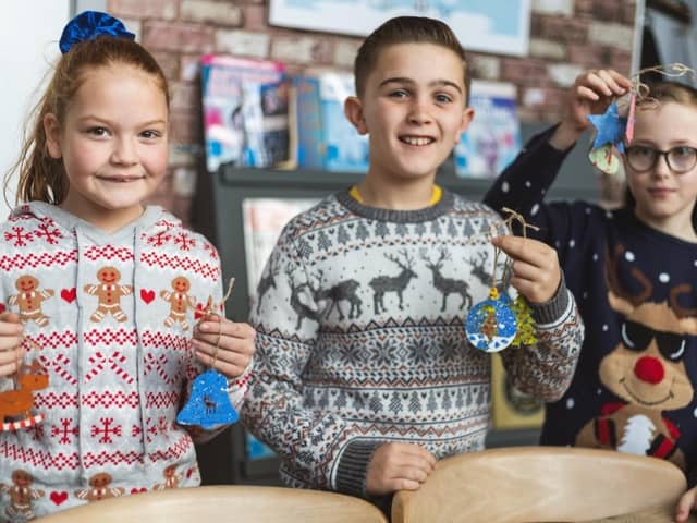 St John's CE Cliviger schoolchildren have designed baubles for a new Miller Homes housing dvelopment's community Christmas tree
