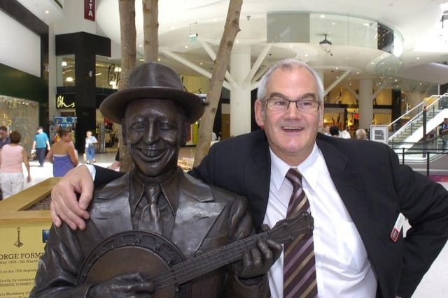 Go shopping in Wigan's Grand Arcade - and pose for a picture with George Formby