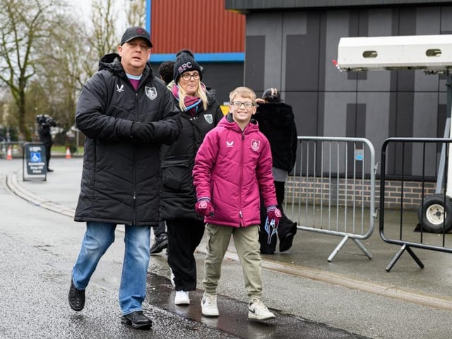 Burnley fans arrive at Turf Moor for the Premier League fixture against West Ham United. Photo: Kelvin Lister-Stuttard