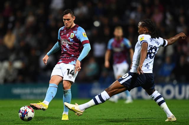 Burnley's Connor Roberts competes with Preston North End's Daniel Johnson
The EFL Sky Bet Championship - Preston North End v Burnley - Tuesday 13th September 2022 - Deepdale - Preston