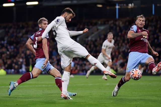 BURNLEY, ENGLAND - SEPTEMBER 23: Bruno Fernandes of Manchester United scores their sides first goal during the Premier League match between Burnley FC and Manchester United at Turf Moor on September 23, 2023 in Burnley, England. (Photo by Lewis Storey/Getty Images)