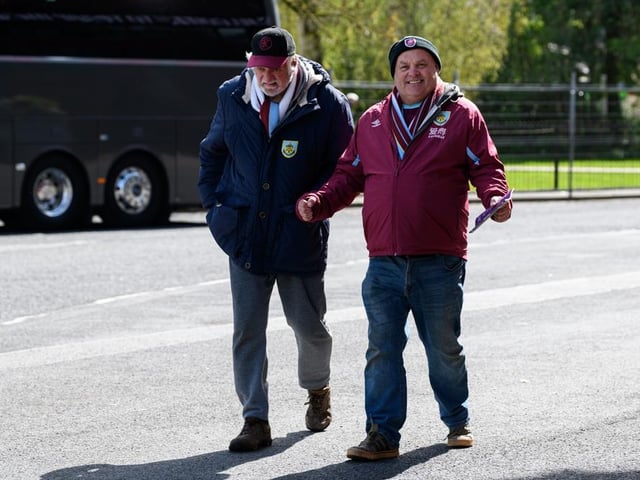 Burnley fans arrive at Turf Moor for the Premier League fixture against Brighton and Hove Albion. Photo: Kelvin Lister-Stuttard