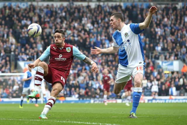 BLACKBURN, ENGLAND - MARCH 09:  Danny Ings of Burnley controls the ball from Michael Keane of Blackburn Rovers during the Sky Bet Championship match between Blackburn Rovers and Burnley at Ewood Park on March 9, 2014 in Blackburn, England.  (Photo by Jan Kruger/Getty Images)