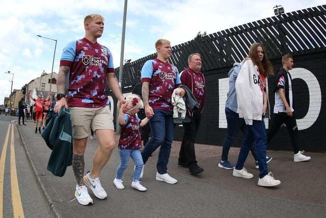BURNLEY, ENGLAND - AUGUST 06: Supporters of Burnley arrive ahead of kickoff during the Sky Bet Championship match between Burnley and Luton Town at Turf Moor on August 06, 2022 in Burnley, England. (Photo by Ashley Allen/Getty Images)