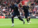 SOUTHAMPTON, ENGLAND - OCTOBER 23:  Maxwel Cornet of Burnley celebrates after scoring his teams first goal during the Premier League match between Southampton and Burnley at St Mary's Stadium on October 23, 2021 in Southampton, England. (Photo by Ryan Pierse/Getty Images)