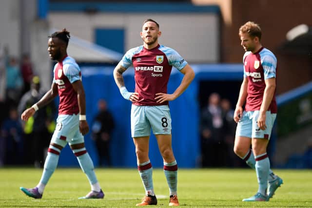 Burnley's English midfielder Josh Brownhill (C) reacts on the final whistle in the English Premier League football match between Burnley and Aston Villa at Turf Moor in Burnley, north west England on May 7, 2022. - Villa won the game 3-1.