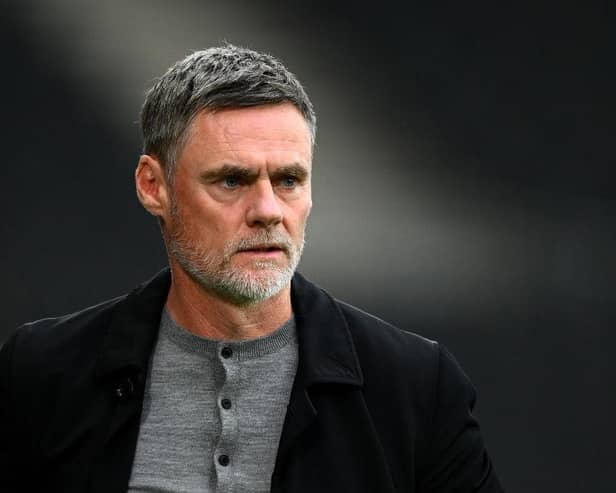 MILTON KEYNES, ENGLAND - AUGUST 08: Graham Alexander, Manager of Milton Keynes Dons on the touchline ahead of during the Carabao Cup First Round match between MK Dons and Wycombe Wanderers at Stadium mk on August 08, 2023 in Milton Keynes, England. (Photo by Clive Mason/Getty Images)