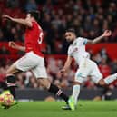 MANCHESTER, ENGLAND - DECEMBER 30: Aaron Lennon of Burnley scores their sides first goal during the Premier League match between Manchester United and Burnley at Old Trafford on December 30, 2021 in Manchester, England. (Photo by Clive Brunskill/Getty Images)