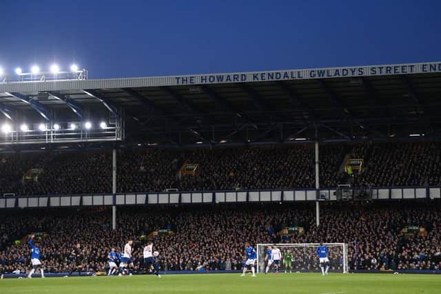 LIVERPOOL, ENGLAND - APRIL 03: A general view of the crowd watching from the Howard Kendall Gwladys Street End during the Premier League match between Everton FC and Tottenham Hotspur at Goodison Park on April 03, 2023 in Liverpool, England. (Photo by Stu Forster/Getty Images)
