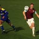Mellon in action for the Clarets in the FA Youth Cup in 2021