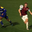 Mellon in action for the Clarets in the FA Youth Cup in 2021