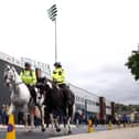 BURNLEY, ENGLAND - AUGUST 27: Police on horses are seen outside the stadium prior to the Premier League match between Burnley FC and Aston Villa at Turf Moor on August 27, 2023 in Burnley, England. (Photo by George Wood/Getty Images)