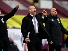 Sean Dyche, manager of Burnley gives his team instructions during the Premier League match between Burnley and West Bromwich Albion at Turf Moor on February 20, 2021.