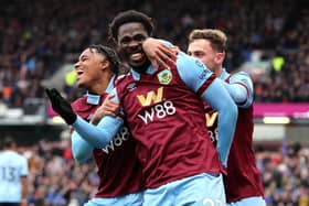 BURNLEY, ENGLAND - MARCH 16: Josh Cullen of Burnley celebrates scoring his team's second goal with teammate Wilson Odobert during the Premier League match between Burnley FC and Brentford FC at Turf Moor on March 16, 2024 in Burnley, England. (Photo by Jan Kruger/Getty Images)