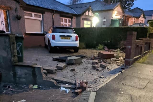 Damaged garden wall in Moseley Road after an accident