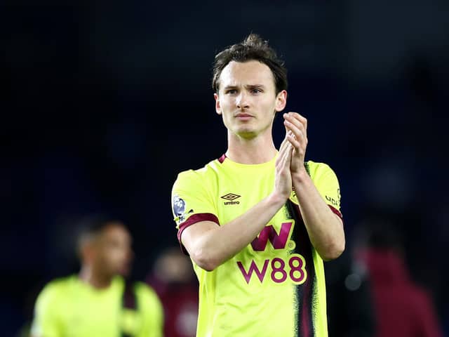 BRIGHTON, ENGLAND - DECEMBER 09: Hjalmar Ekdal of Burnley acknowledges the fans following the Premier League match between Brighton & Hove Albion and Burnley FC at American Express Community Stadium on December 09, 2023 in Brighton, England. (Photo by Bryn Lennon/Getty Images)