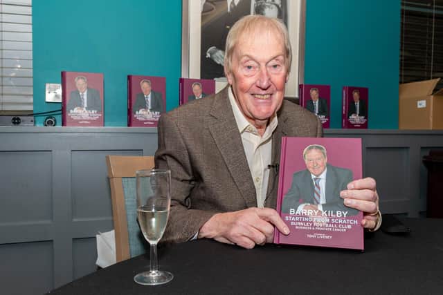 Former Burnley chairman Barry Kilby with his new book Starting From Scratch. Photo: Kelvin Stuttard
