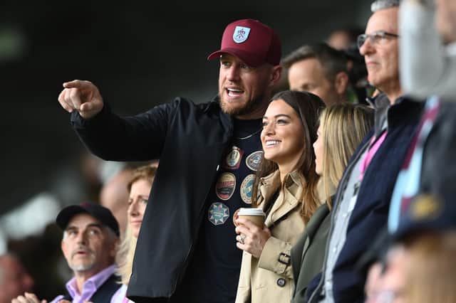 BURNLEY, ENGLAND - MAY 08: NFL legend and Burnley FC stakeholder JJ Watt watches the match with wife Kealia during the Sky Bet Championship between Burnley and Cardiff City at Turf Moor on May 08, 2023 in Burnley, England. (Photo by Gareth Copley/Getty Images)