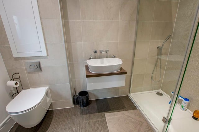 Also among the three bathrooms are two en-suite shower rooms.