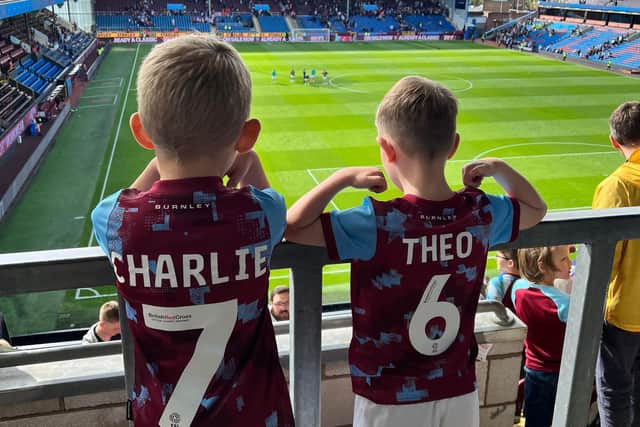 Charlie and Theo ready to watch their beloved Burnley play at Turf Moor