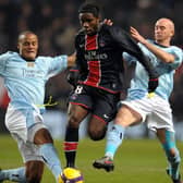 Paris Saint-Germain's French forward Péguy Luyindula (C) vies with Manchester City's Irish midfielder Stephen Ireland (R) and Manchester City's Belgian defender Vincent Kompany during their UEFA Cup group A football match at the City of Manchester stadium, in Manchester, north-west England, on December 3 2008. AFP PHOTO/ANDREW YATES (Photo credit should read ANDREW YATES/AFP via Getty Images)