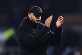 BURNLEY, ENGLAND - DECEMBER 26: Vincent Kompany, Manager of Burnley, looks dejected as he applauds the fans at full-time following their team's defeat in the Premier League match between Burnley FC and Liverpool FC at Turf Moor on December 26, 2023 in Burnley, England. (Photo by Jan Kruger/Getty Images)