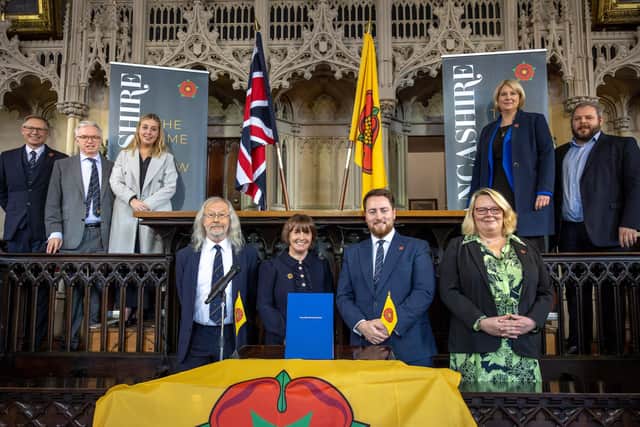 Lancashire MPs (back row) and top-tier council leaders join Levelling Up Minister Jacob Young MP (front, second from right) for the signing ceremony at Lancaster Castle