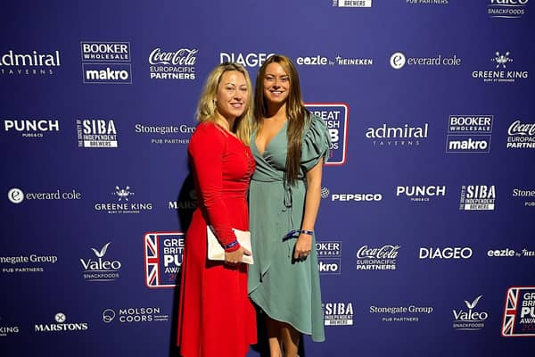 The Royal Dyche landlady Justine Lorriman and wife Steph at the Great British Pub Awards 2023 in Manchester