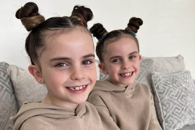 Identical twin sisters Marnie (left) and Mylah Green, who are eight and live in Burnley, have gone viral on TikTok after their aunt shared a video of their hilarious reaction to the cost of two ice creams while on trip to Towneley Park