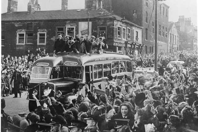 Burnley FC players arrive home to a resounding welcome from fans after narrowly losing the FA Cup Final to Charlton Athletic in April 1947.