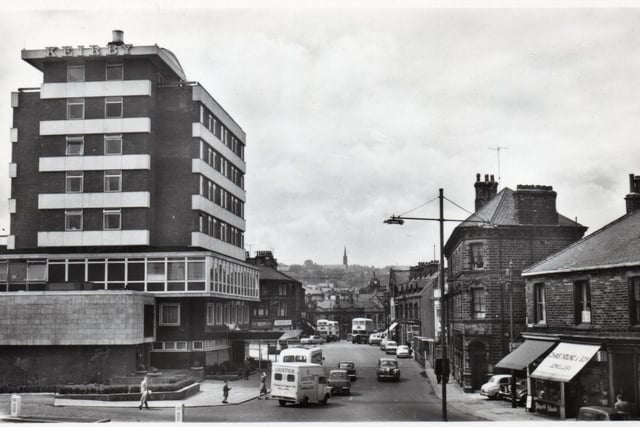 This street is now Kierby Walk but, for hundreds of years, it was Church Street. The hotel, once one of the best in the north of England, was built by Massey’s Burnley Brewery, in 1958. Many of the buildings on the right of the Walk have survived.
