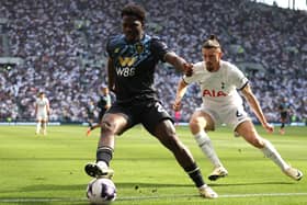 LONDON, ENGLAND - MAY 11: Datro Fofana of Burnley controls the ball under pressure from Radu Dragusin of Tottenham Hotspur during the Premier League match between Tottenham Hotspur and Burnley FC at Tottenham Hotspur Stadium on May 11, 2024 in London, England. (Photo by Julian Finney/Getty Images)