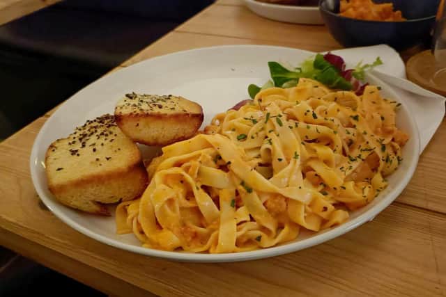 Smoked salmon tagliatelle with a tomato, lemon and cream sauce plus garlic bread at The Loom in Burnley.