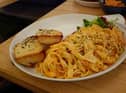 Smoked salmon tagliatelle with a tomato, lemon and cream sauce plus garlic bread at The Loom in Burnley.