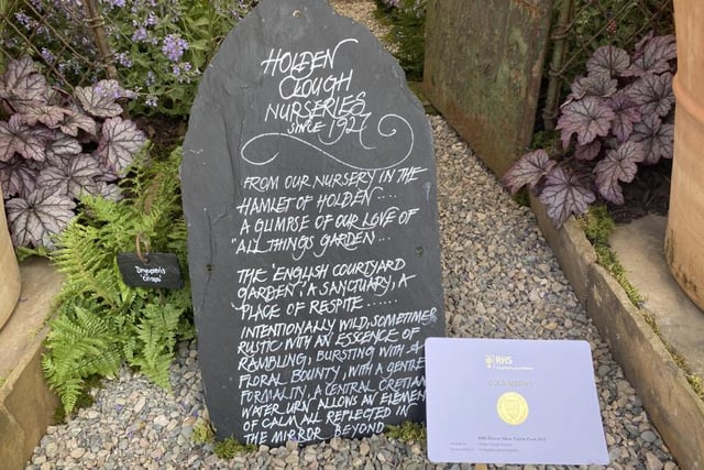 Signage at the Holden Clough stand at the Tatton show describes the gentle formality of the courtyard garden and its role as a sanctuary  Photo:Fiona Finch