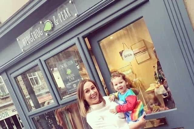 Melanie Riding, (pictured here with her daughter  Emily)  is  owner of childrenswear shop Hedgehog and Pear which is hosting a facebook live auction tomorrow night with  family-friendly cafe, Violet's. Both businesses are based in Clitheroe