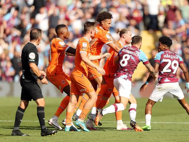 Burnley's Ian Maatsen gets involved in an altercation following an incident with Blackpool's Sonny Carey (not pictured). Both were subsequently shown a red card by referee Keith StroudPhotographer Rich Linley/CameraSportThe EFL Sky Bet Championship - Burnley v Blackpool - Saturday 20th August 2022 - Turf Moor - BurnleyWorld Copyright © 2022 CameraSport. All rights reserved. 43 Linden Ave. Countesthorpe. Leicester. England. LE8 5PG - Tel: +44 (0) 116 277 4147 - admin@camerasport.com - www.camerasport.com