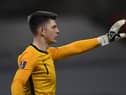 England's goalkeeper Nick Pope gestures during the FIFA World Cup Qatar 2022 qualification Group I football match between Albania and England at the Arena Kombetare (Air Albania Stadium), in Tirana, on March 28, 2021. (Photo by OZAN KOSE / AFP) (Photo by OZAN KOSE/AFP via Getty Images)