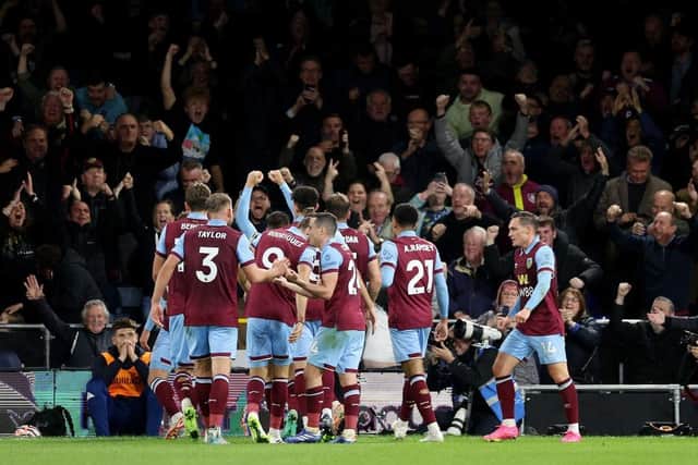 LUTON, ENGLAND - OCTOBER 03: Jacob Bruun Larsen of Burnley (obscured) celebrates with teammates after scoring the team's second goal during the Premier League match between Luton Town and Burnley FC at Kenilworth Road on October 03, 2023 in Luton, England. (Photo by Warren Little/Getty Images)