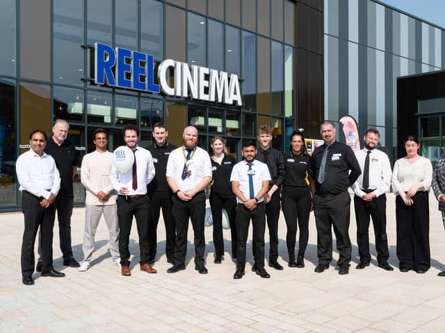 REEL Cinema staff outside the new cinema on its opening day. Photo: Kelvin Lister-Stuttard