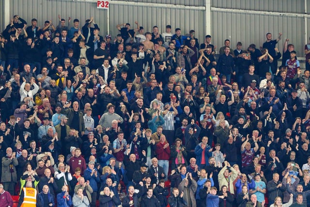Burnley fans celebrate after the match