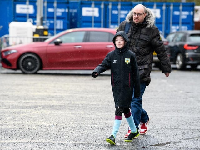 Burnley fans arrive at Turf Moor for the Premier League fixture against West Ham United. Photo: Kelvin Lister-Stuttard