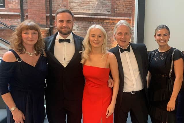 Holly Harker (centre) with her dad (right) and some of the Little Lancashire Village team at the Red Rose Awards last year.