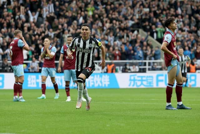 NEWCASTLE UPON TYNE, ENGLAND - SEPTEMBER 30: Miguel Almiron of Newcastle United celebrates after scoring the team's first goal during the Premier League match between Newcastle United and Burnley FC at St. James Park on September 30, 2023 in Newcastle upon Tyne, England. (Photo by Ian MacNicol/Getty Images)