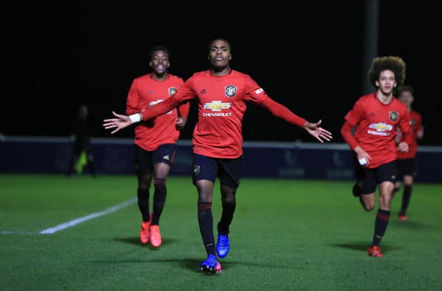 HALEWOOD, ENGLAND - MARCH 10: Ayodeji Sotona of Manchester United U18s celebrates scoring their third goal during the U18 Premier League match between Everton U18s and Manchester United U18s at USM Finch Farm on March 10, 2020 in Halewood, England. (Photo by Tom Purslow/Manchester United via Getty Images)