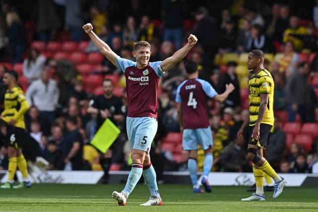 Burnley's English defender James Tarkowski celebrates on the final whistle in the English Premier League football match between Watford and Burnley at Vicarage Road Stadium in Watford, north-west of London, on April 30, 2022. - Burnley won the game 2-1.